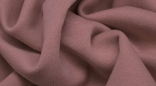 Miękka, różowa dresówka pętelkowa, idealna na wygodne bluzy i spodnie.